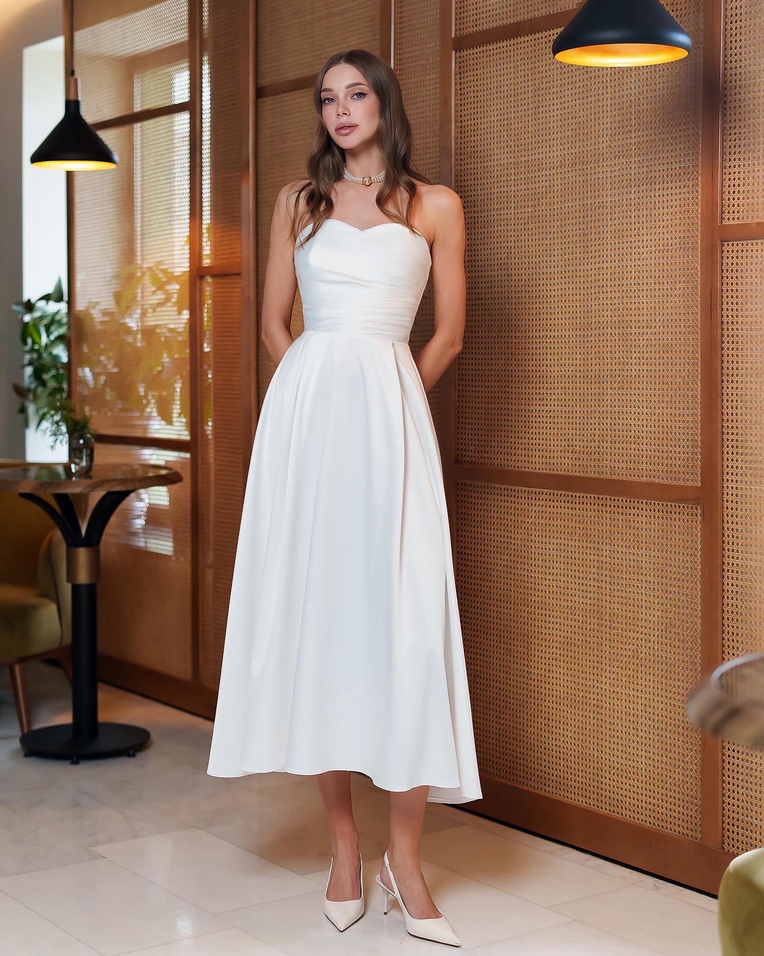 Elegant Ivory Strapless A-Line Midi Dress with Pleated Bodice